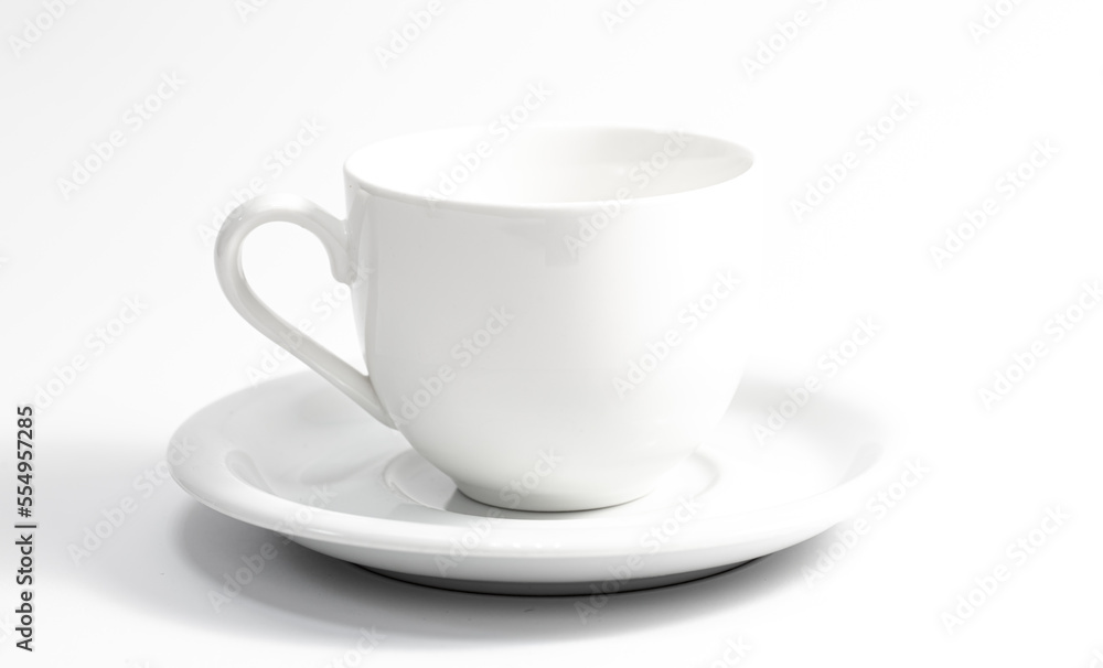 White cup and saucer isolated on white background. White cup and saucer isolated on white background.