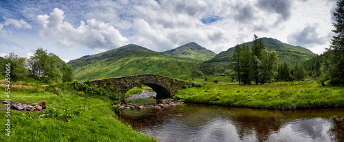 Panoramic view of Butter Bridge over Kinglas Water in the Loch Lomond National Park in Scotland. photo