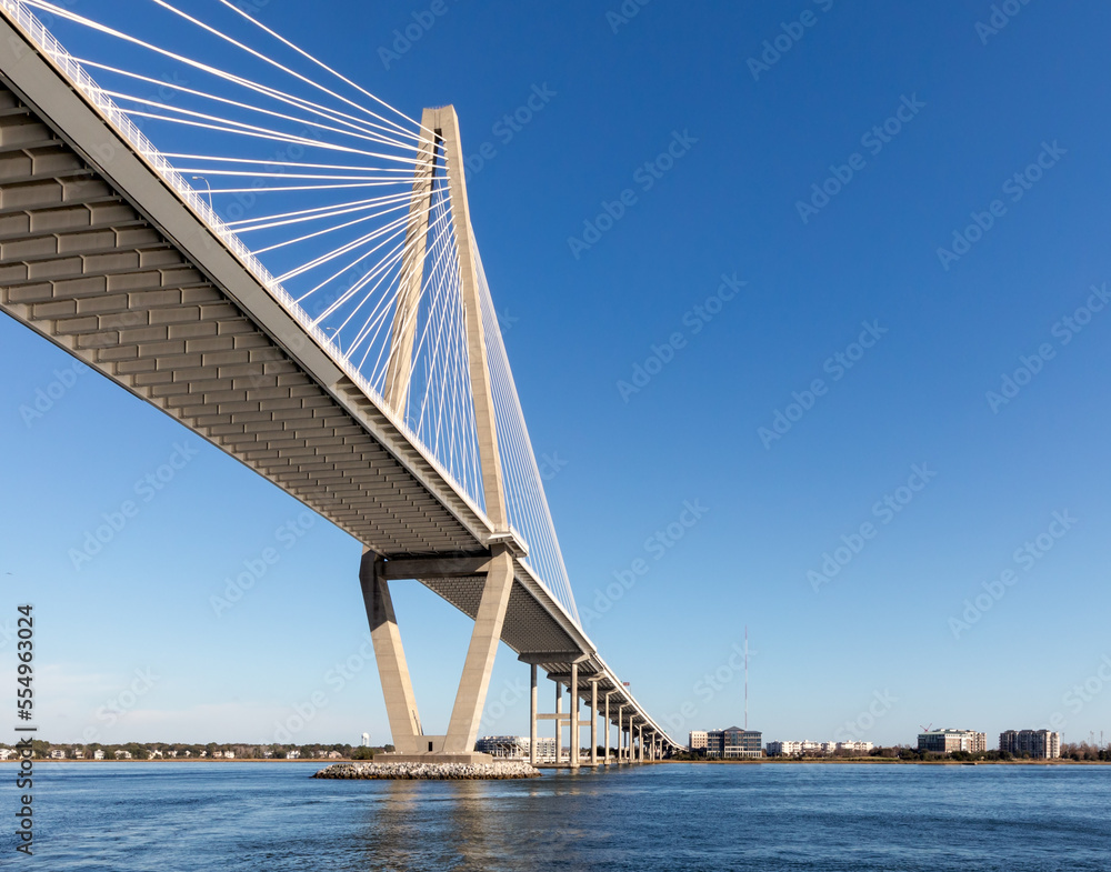 Wide angle view of Arthur Ravenel Jr. Bridge in Charleston, South Carolina, on a bright blue sunshine day. Wide angle view of Arthur Ravenel Jr. Bridge in Charleston, South Carolina, on a bright blue sunshine day.