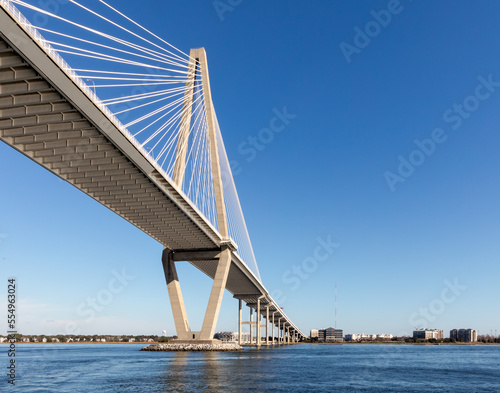Wide angle view of Arthur Ravenel Jr. Bridge in Charleston, South Carolina, on a bright blue sunshine day.