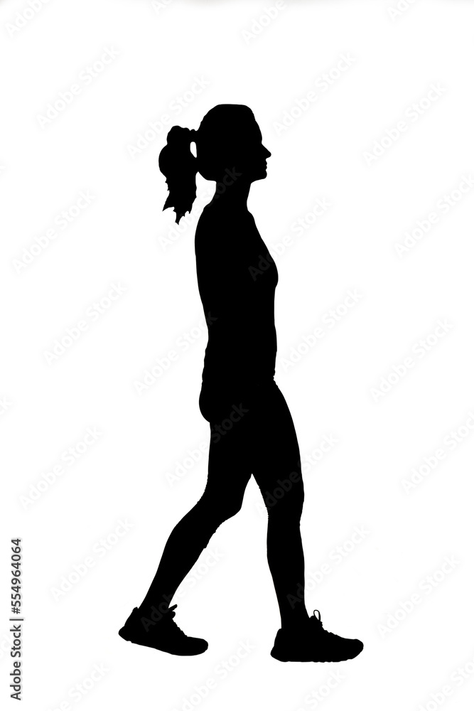 silhouette of a  side view of a  woman with sportswear walking on white background