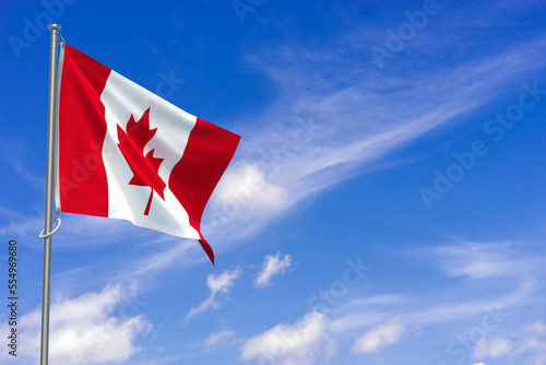 Canada flags over blue sky background. 3D illustration