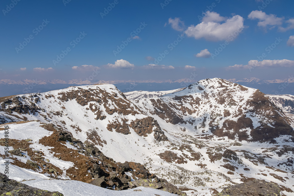 Scenic view of Kreiskogel seen from Scharfes Eck, Seetal Alps, Styria, Austria, Europe. Alpine pasture and ridges with background view of snowcapped peaks of Ennstaler Alps, Northern Limestone Alps