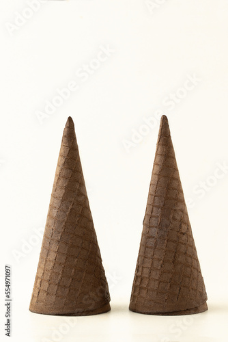 Chocolate waffles ice cream cone isolated on white background.