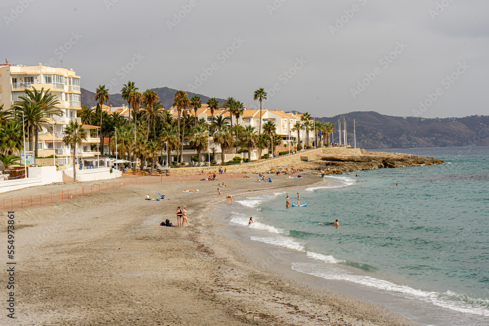 View on seashore beach and promenade from Balcon de Europa in Nerja, Spain on October 16, 2022