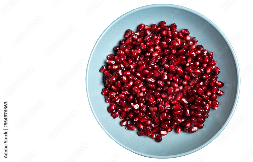 Grains of tasty bright red peeled pomegranate lie in a plate on a white isolated background. Top view. Close-up. Grains of tasty bright red peeled pomegranate lie in a plate on a white isolated background. Top view. Close-up.