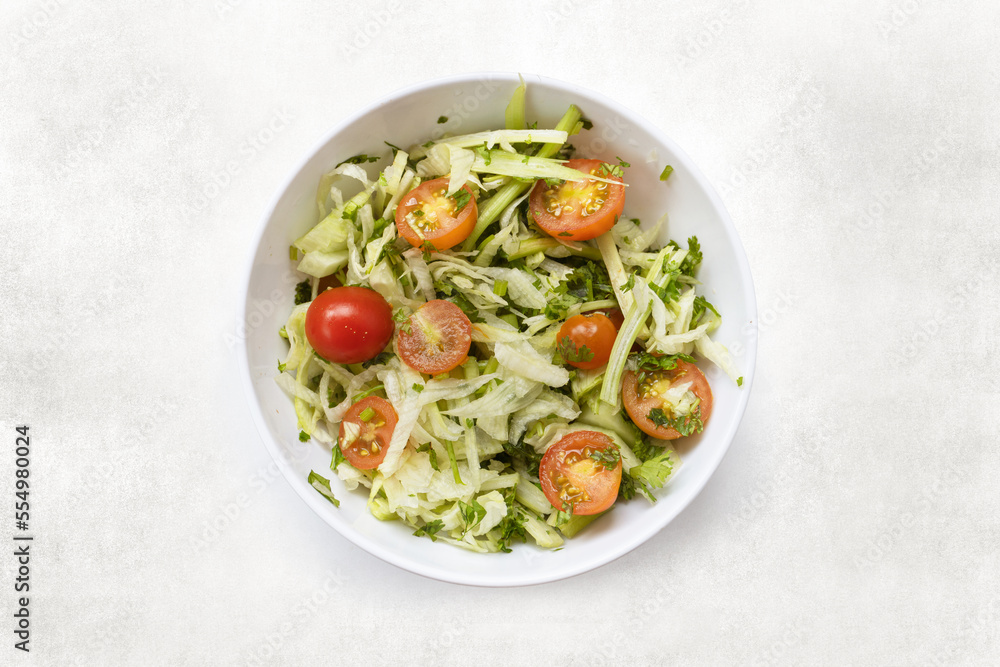 delicious green salad with tomatoes in bowl