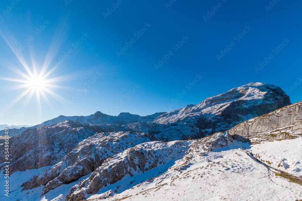 snow covered mountains in autumn during a sunny day (Alps, Vorarlberg, Austria)