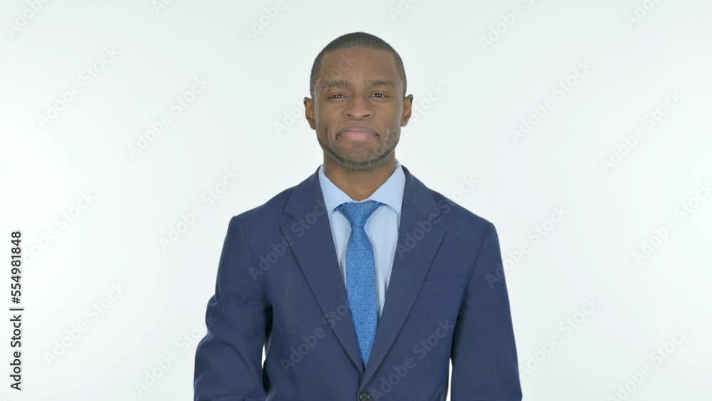 Thumbs Up by African Businessman on White Background Thumbs Up by African Businessman on White Background