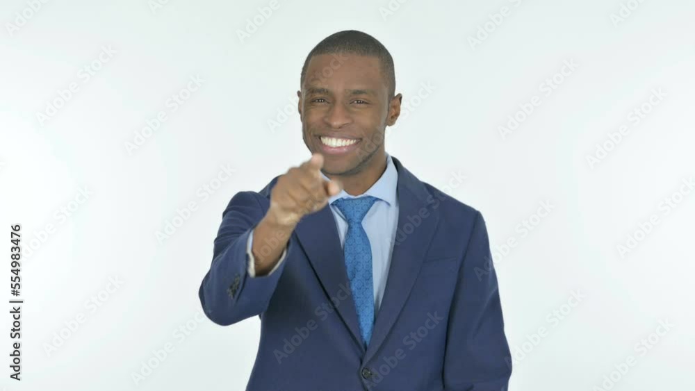 African Businessman Pointing at the Camera on White Background African Businessman Pointing at the Camera on White Background