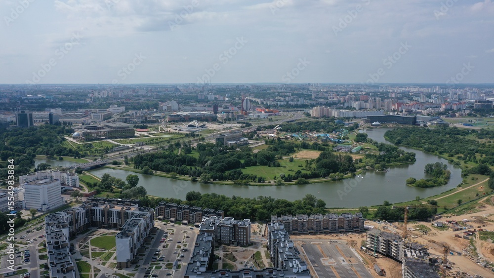 Minsk, Belarus - 01.08.2022: Aerial view of the Svisloch River, on which stands Minsk, the capital of Belarus. Panorama of the center of Minsk. Palace of Independence in Minsk. Presidential palace.