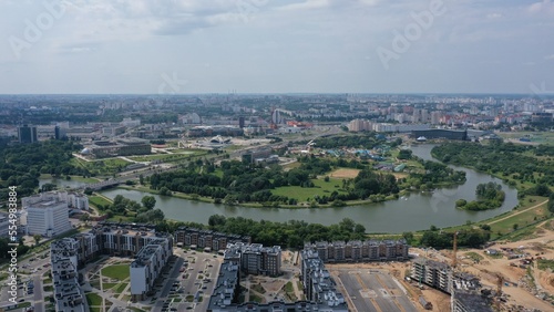 Minsk, Belarus - 01.08.2022: Aerial view of the Svisloch River, on which stands Minsk, the capital of Belarus. Panorama of the center of Minsk. Palace of Independence in Minsk. Presidential palace. © Aerial Drone Master