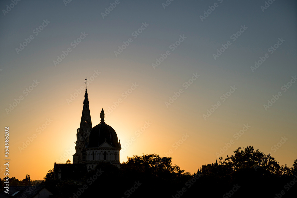 Notre Dame Church Backlight during golden sunset without cloud, Chateauroux, Indre, France