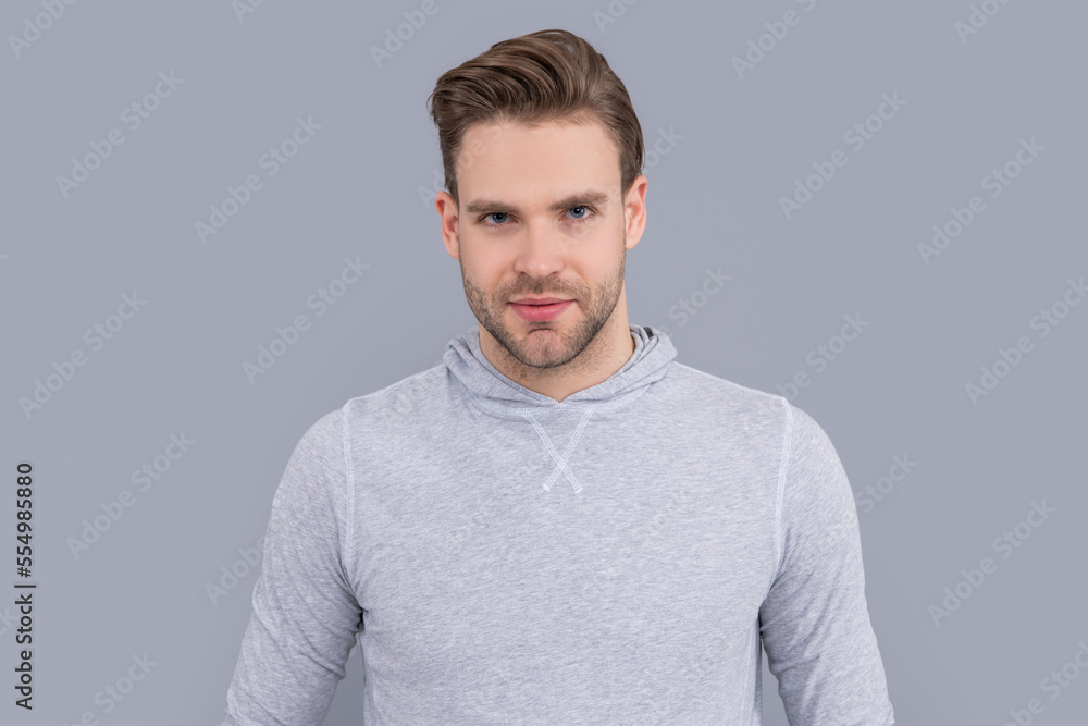 Fototapeta premium Portrait of man. Young man with unshaven face. Handsome man studio. Caucasian man in casual