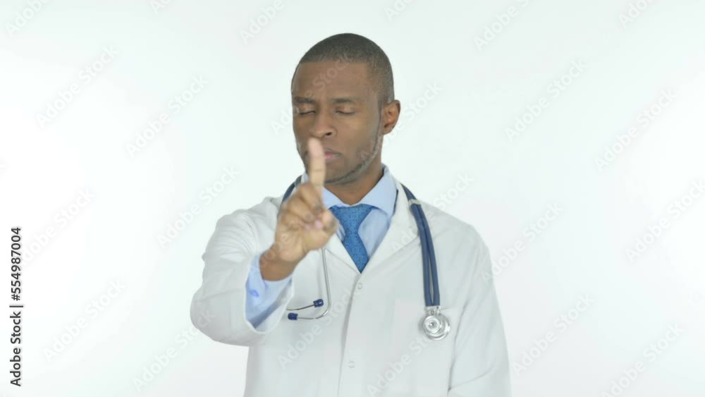 Denying African Doctor Disapproving on White Background Denying African Doctor Disapproving on White Background