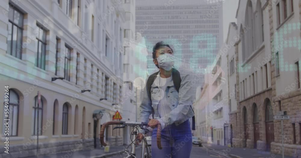 Animation of stock market data processing over asian woman wearing face mask with bicycle walking Animation of stock market data processing over asian woman wearing face mask with bicycle walking