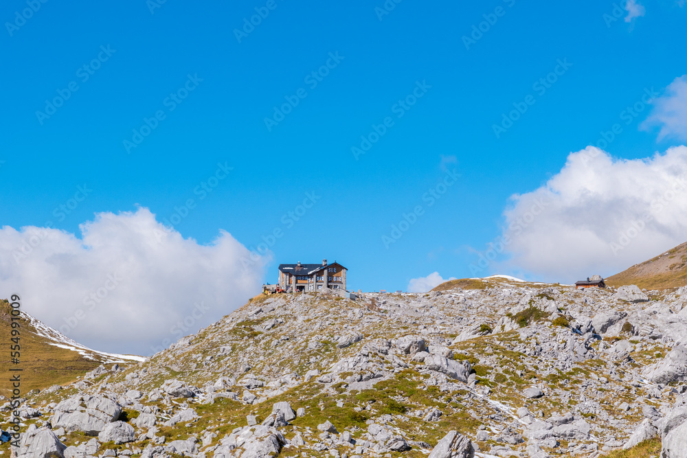 Mountain range with a mountain hut in Switzerland