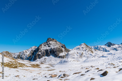 An alpine landscape covered in snow on a sunny day during summer  Vorarlberg  Austria 