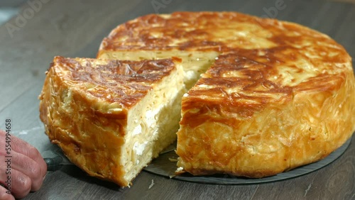 Turkish traditional pastry, Su böreği, Karaköy Böreği, Karakoy böregi, su boregi, Turkish Su Boregi pie, Tabla borek or burek in plate. Bosnak boregi, gocmen boregi, kapali pide, pide, kıymalı borek,  photo