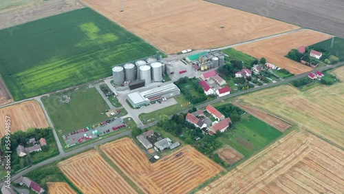 Aerial view of a farm and large grain storage silos, elevators
