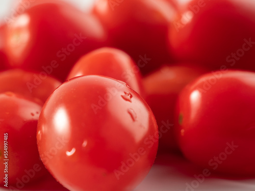 Wallpaper Mural Red cherry tomatoes. Red tomatoes on a white background. Torontodigital.ca