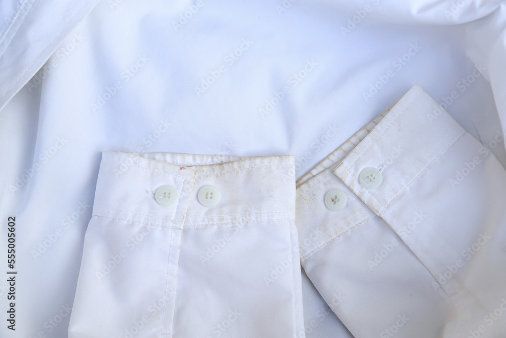 dirty stain on part of shirt from daily life activity for cleaning concept. selective focus. dirty stain on part of shirt from daily life activity for cleaning concept. selective focus.