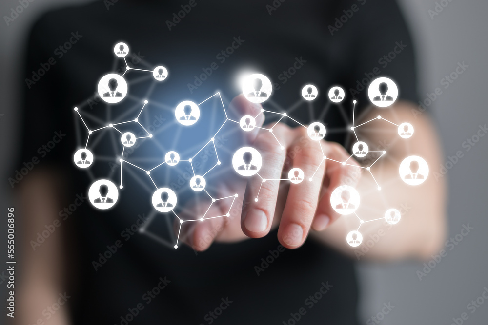 . Virtual visualization of network chain with person icons, female unrecognised manager on background. Human capital and teambuilding concept. . Virtual visualization of network chain with person icons, female unrecognised manager on background. Human capital and teambuilding concept.