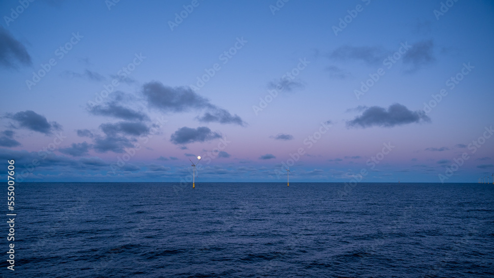 Early morning at offshore wind farm.