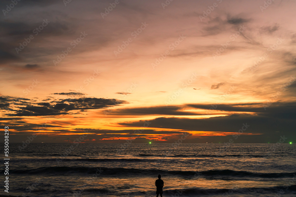 Sunset sky background and white clouds soft focus at Phuket Thailand.