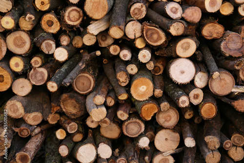 Stack of cut firewood as background  closeup view