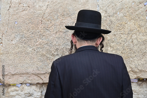 Orthodox Jewish man pray at the Western Wall Jerusalem Israel