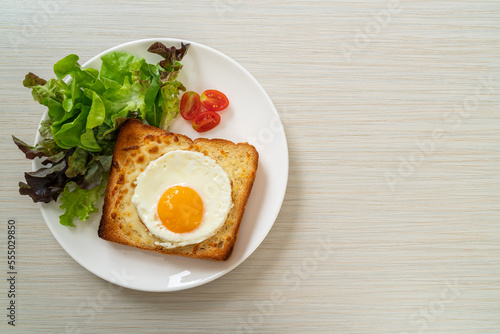 bread toasted with cheese and fried egg