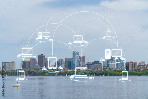 Panorama skyline, city view of Boston at day time, Massachusetts. Financial downtown. Glowing Social media icons. The concept of networking and establishing new business connections between people
