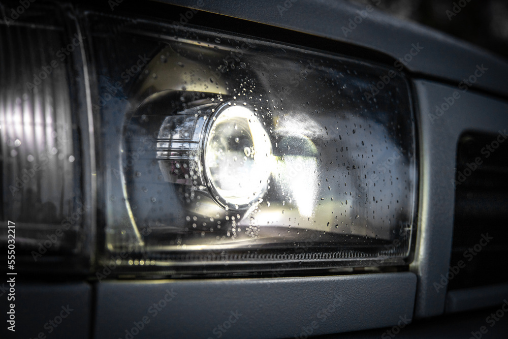 LED lenses in the headlight of a suv car.