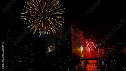 Abstract image of firework background in the city for a Celebration and anniversary concept
