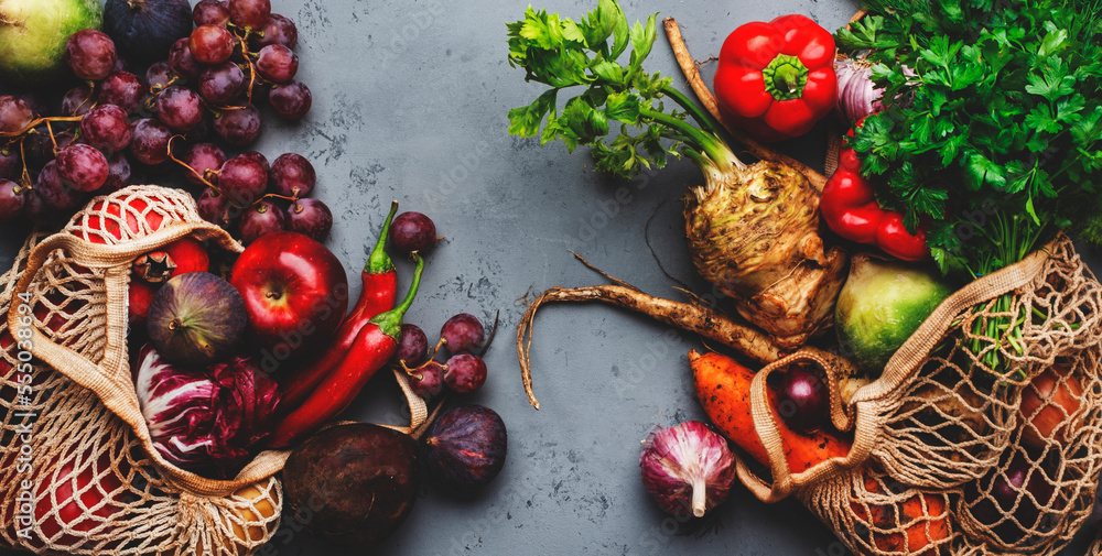Food background with vegetables, root crops and fruits in string bag ...