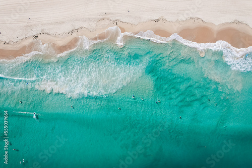 Top down view of the waves breaking on Trigg Beach in Perth, Western Australia