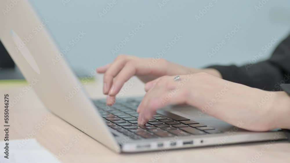 Close up of Hands Typing on Laptop Close up of Hands Typing on Laptop