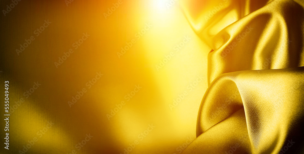 Luxury golden pure silk background template with place for text Luxury golden pure silk background template with place for text