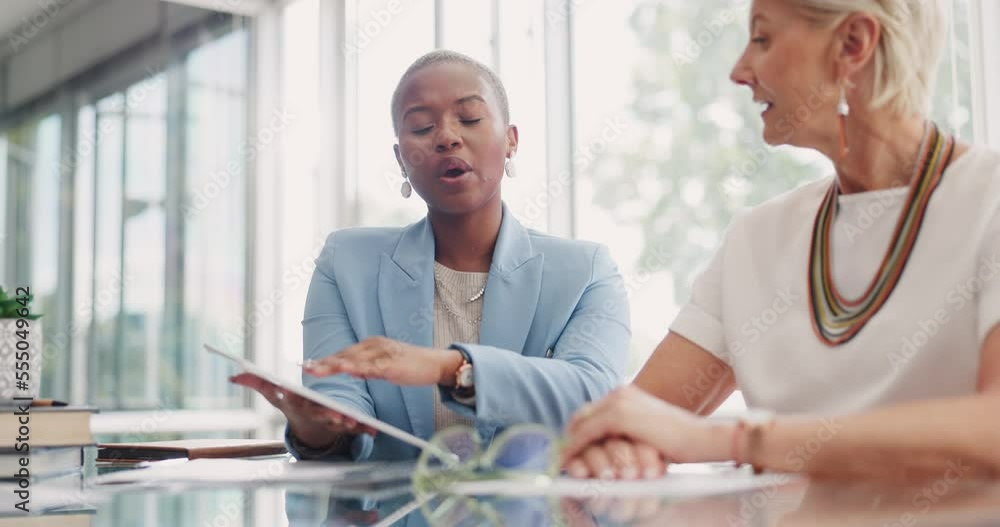 Strategy, tablet and women in discussion in business meeting for planning, communication and ideas. Teamwork, collaboration and female workers in conversation, speaking and talking about project