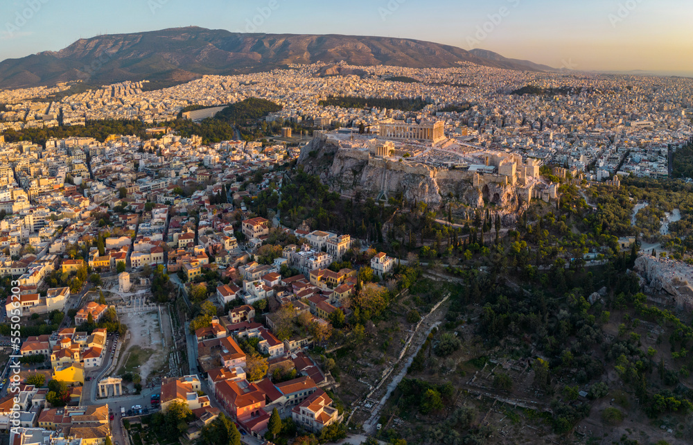 Aerial view of the city Athens in Greece on an early sunny afternoon in autumn.	