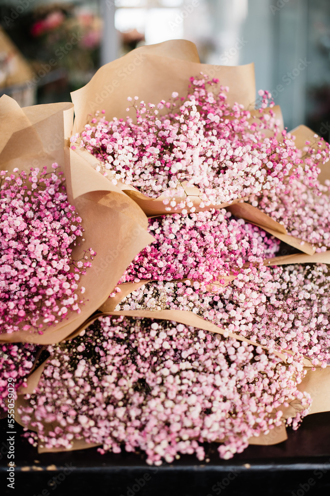custom made wallpaper toronto digitalBig pile of pink baby breath flower bouquets, wrapped in craft paper