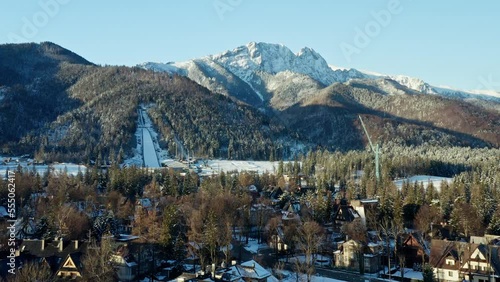 Drone Aerial Zakopane Tatra Mountains Ski Slopes Reveal from church