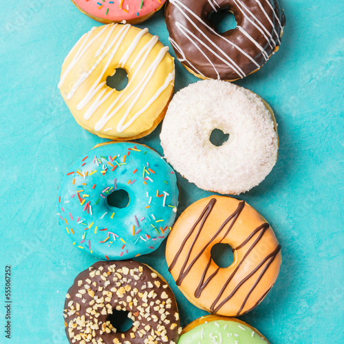 donuts on blue background, top view