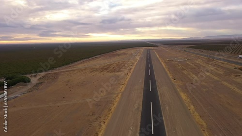 Small airplane landing strip in Central California next to Highway 5 near Coalinga photo