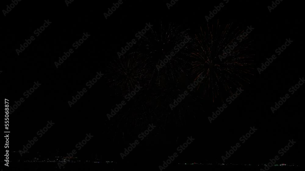Fireworks explosion at night at sea. Fireworks explosion at night at sea.