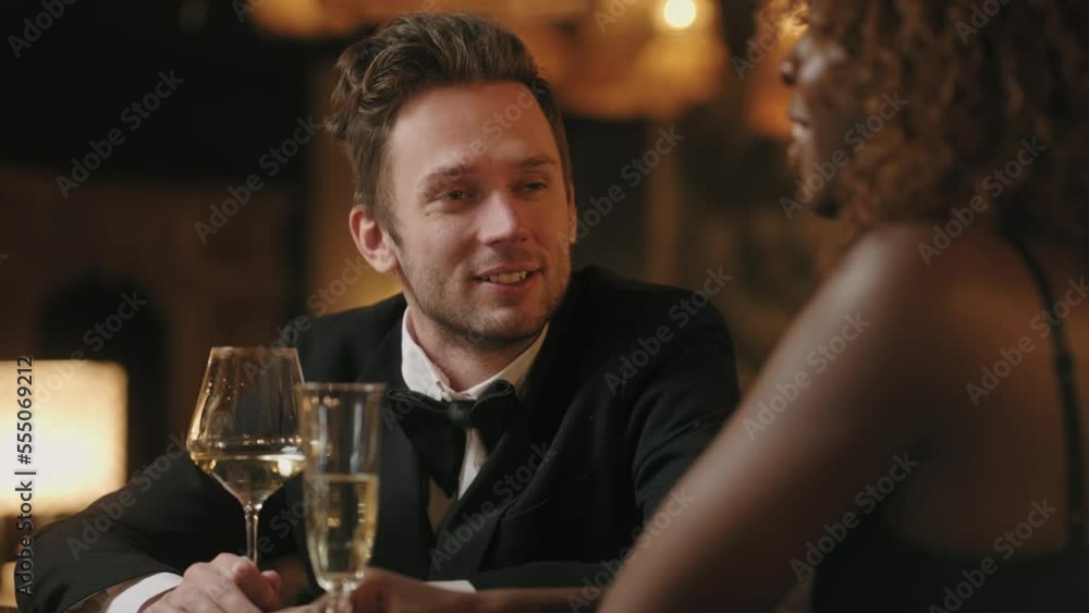 white man in love with beautiful african american woman, date in restaurant in evening, portrait white man in love with beautiful african american woman, date in restaurant in evening, portrait