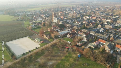 Drone flying towards the unfinished Church tower of the Pieterskerk in Beesd, the Netherlands photo