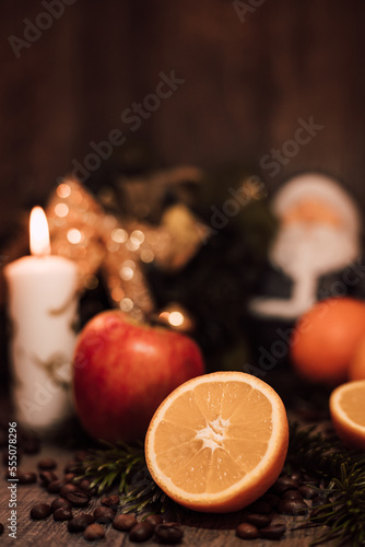 Christmas composition coffee beans  orange  wine  candle. New Year s table