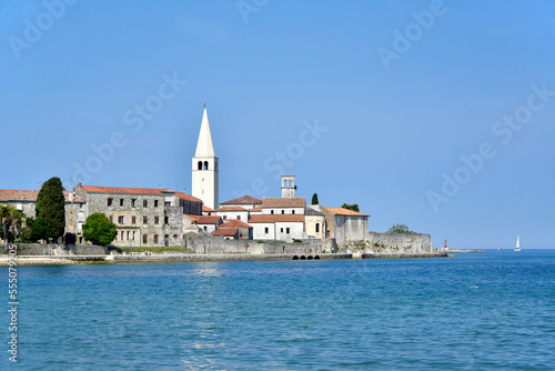 View of the old town of Porec, Istria, Croatia. Tower of Euphrasian Basilica in Porec